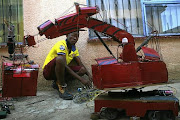 Mpho Makutu can afford to buy groceries and pay his monthly rent from the money he makes from building his creations.