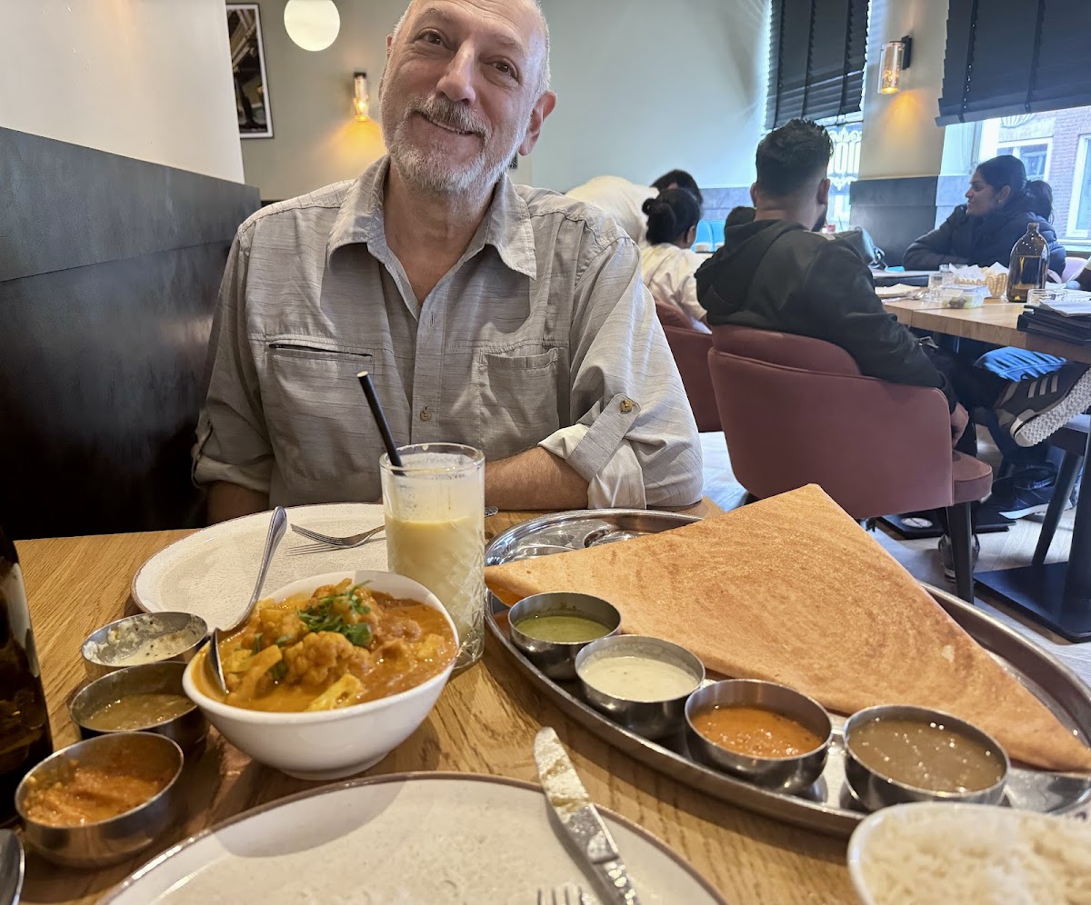 Dosa and aloo gobi and a happy diner