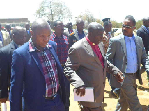 Yatta MP Francis Mwangangi, AIC Bishop Kenya Dr. Cyrus Yego and Murang’a Governor Mwagi Wa Iria arrive at AIC Matuu on Sunday for a Church Harambee. Pix Andrew Mbuva