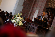 Themba Dloti’s father, Thabo, mourns his son's death at a memorial service held at Michaelhouse on Friday. 