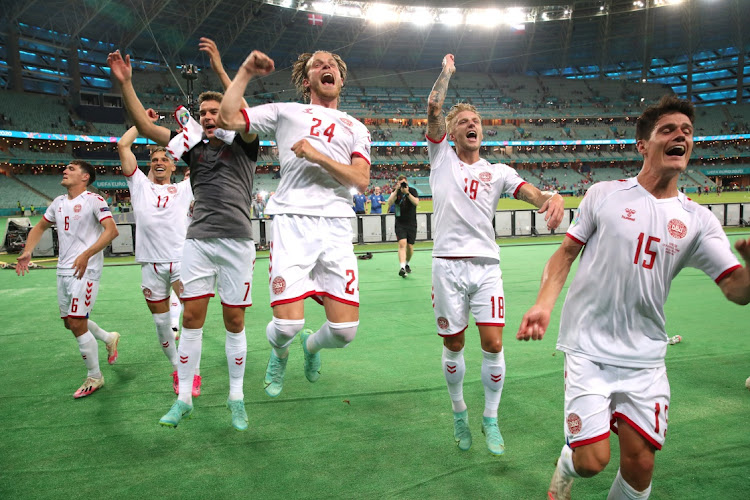 Denmark players celebrate and book their spot in the semi-final after their victory against Czech Republic at Baku Olympic Stadium, Azerbaijan on Saturday.