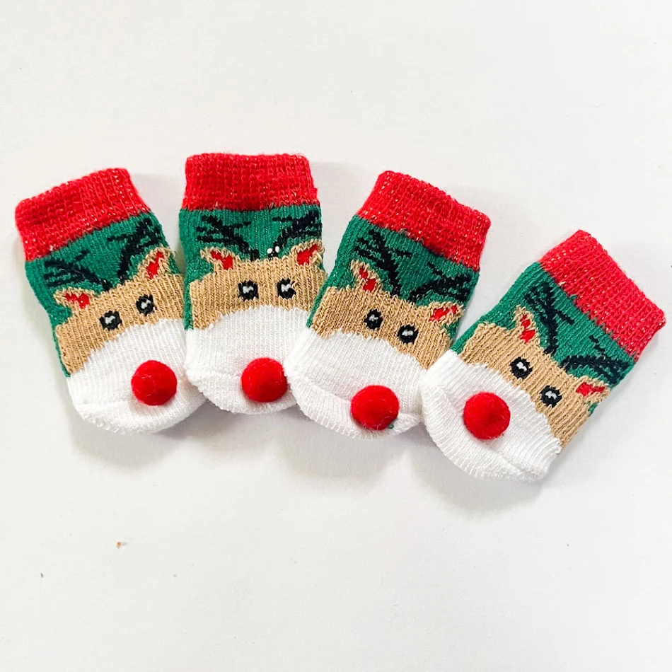 Kerst sokken voor honden Kerstman Eland. Bescherm de poten van uw hond en voeg feestelijke vreugde toe.