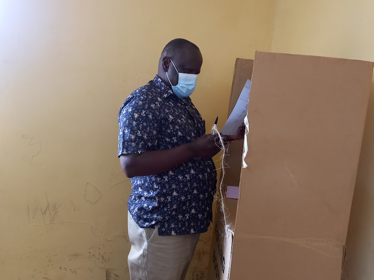 Chama Cha Mashinani (CCM) party leader Isaac Rutto cast his vote at Chebaraa primary school in Chepalungu on August 9.