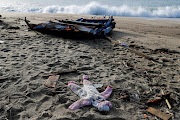 A piece of the boat and a piece of clothing from the deadly migrant shipwreck are seen in Steccato di Cutro near Crotone, Italy, February 28, 2023.