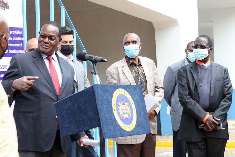 CAS Chris Obure, Matatu Owners Association chairman Dickson Mbugua and Chairman of the Association of Bus Operators Edwin Mukabanah while making the announcement on August 6, 2021.