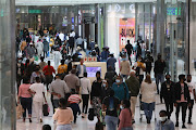 Shoppers make their way through a crowded Mall of Africa in Midrand on Black Friday, November 26 2021.