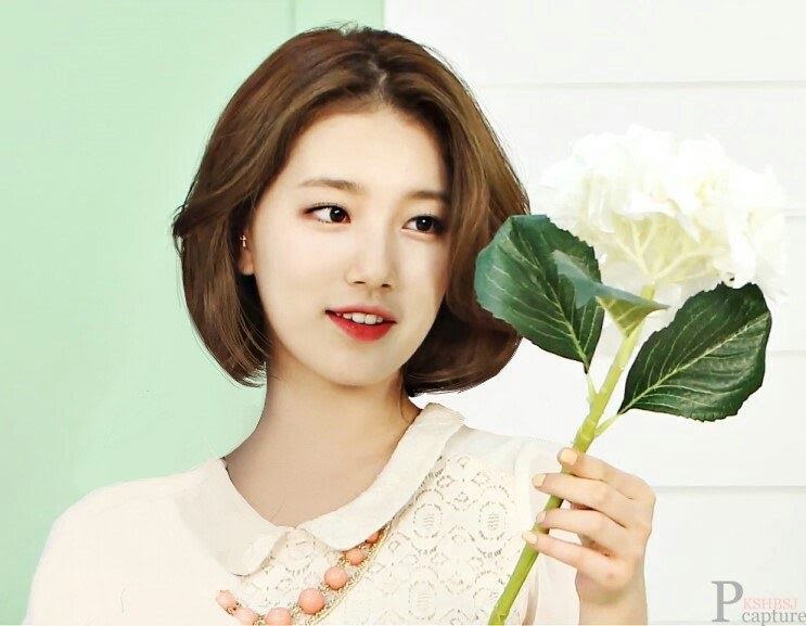 A fan photoshops female idols to have short hair.