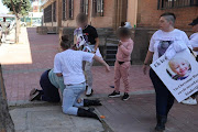 A community member attending the trial of toddler Chevonne Rusch’s alleged killer assaulted a woman who accompanied the child's mother to the Germiston magistrate's court. Faces have been blurred to protect children's identities.