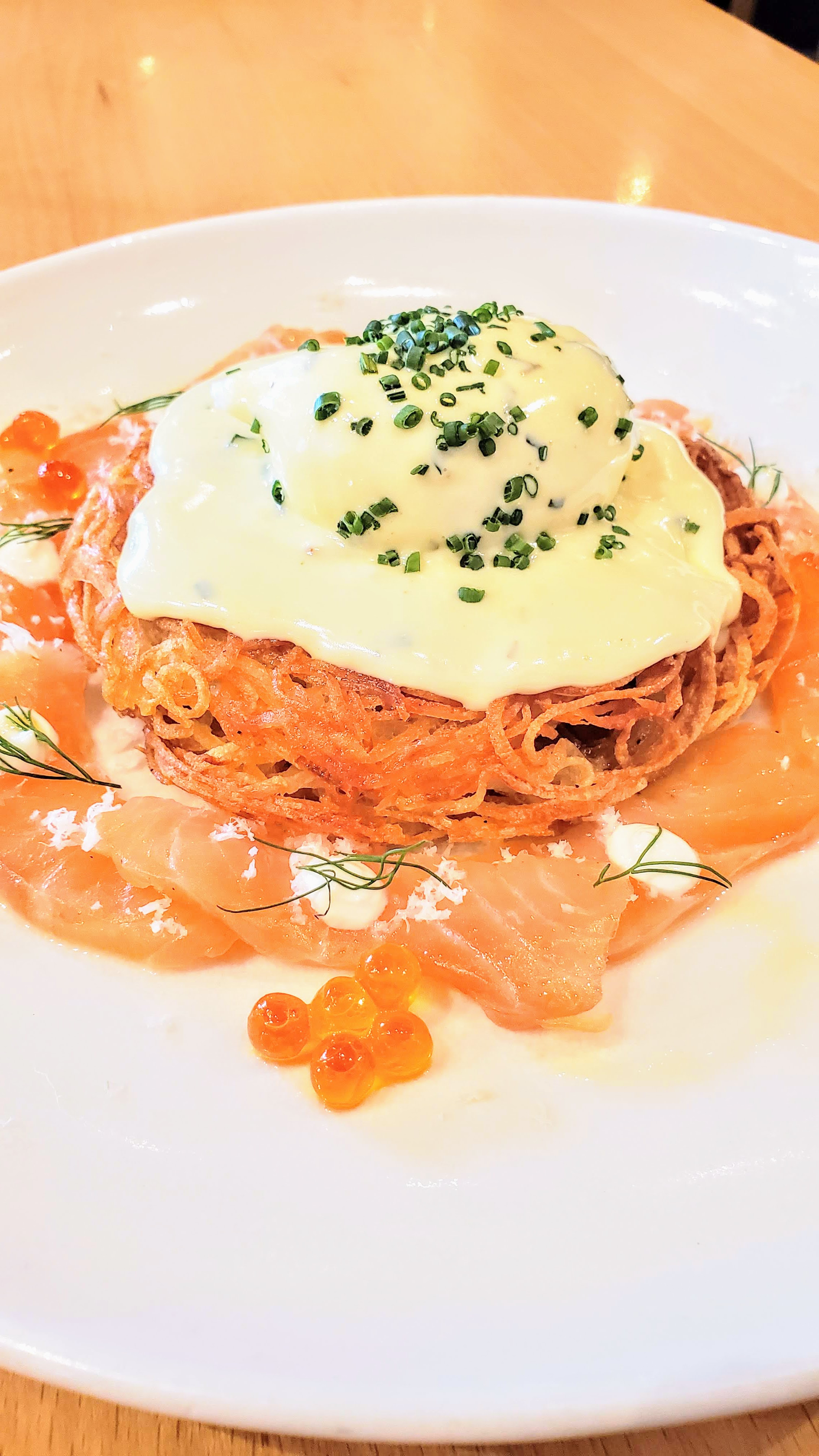 Recommendations at Bistro Agnes: Smoked Salmon Rösti with that layer of crispy potato rösti, silky house smoked salmon carpaccio, and sexy poached egg, topped with dill, horseradish, and béarnaise at brunch