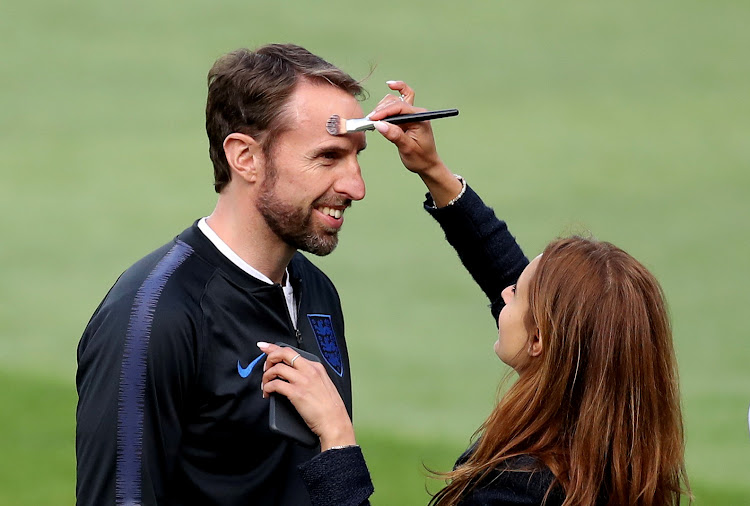 England manager Gareth Southgate has make-up put on him before giving an interview during the Uefa Nations League