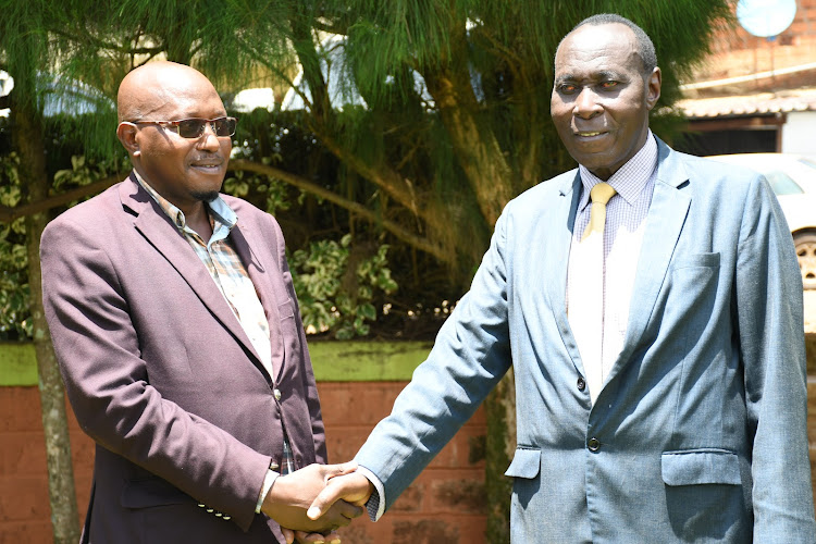 Joseph Kiangoi and Julius Mokogi in Nyamira on Tuesday