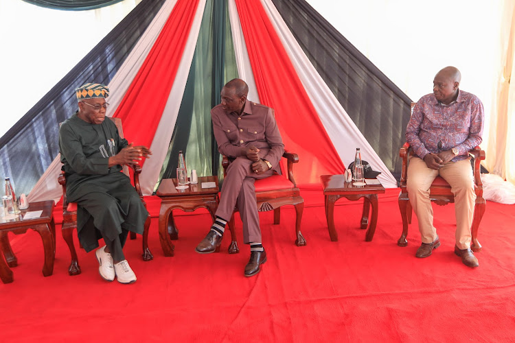 Former Nigerian President Olusegun Obasanjo speaking to President William Ruto and Deputy President Rigathi Gachagua on February 15, 2024.