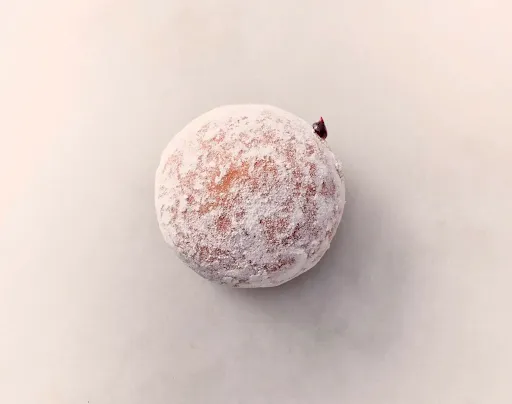 Powdered Blueberry Filled Doughnut
