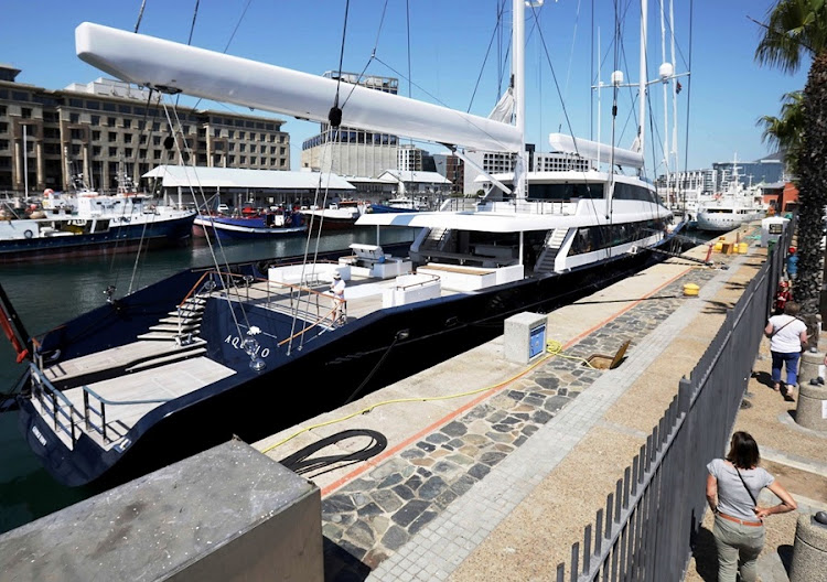 The 86m superyacht Aquijo moored outside the Table Bay Hotel at the V&A Waterfront in Cape Town.