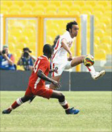 COVERED: Morocco's Tarik Sektioui is kept in check by Nambia's Quinton Jacobs. Namibia lost 5-1. Pic. Anesh Debiky. 21/01/2008. © Backpagepix.