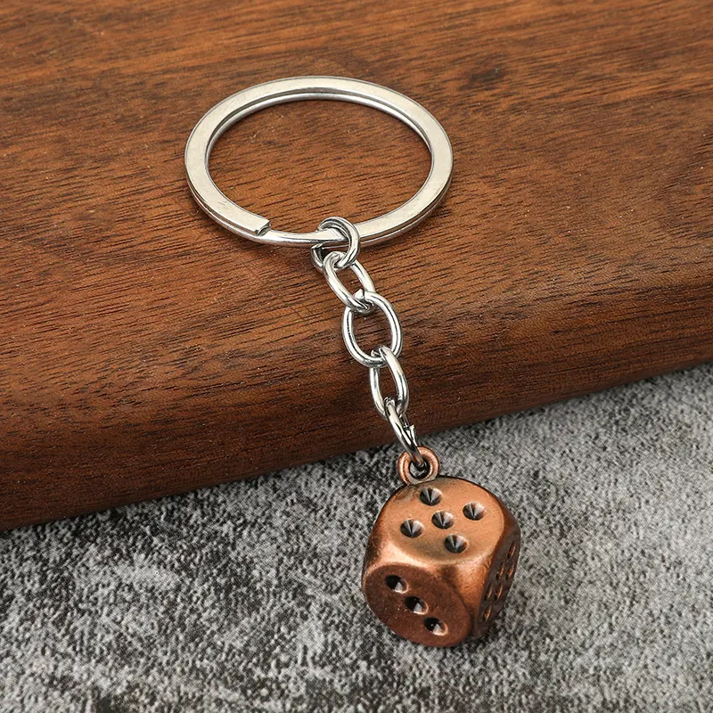 Zinklegering speelkaarten dobbelstenen mahjong sleutelhanger voor gokkers. Compact, duurzaam en ideaal voor onderweg. Leuk cadeau-idee.