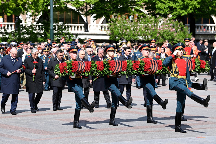 Belarusian President Alexander Lukashenko, Kazakh President Kassym-Jomart Tokayev, Kyrgyz President Sadyr Japarov, Russian President Vladimir Putin, Tajik President Emomali Rakhmon, Turkmen President Serdar Berdymukhamedov and Uzbek President Shavkat Mirziyoyev take part in a flower-laying ceremony at the Tomb of the Unknown Soldier on Victory Day, which marks the 78th anniversary of the victory over Nazi Germany in World War Two, in central Moscow, Russia May 9, 2023.