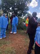 Police at the crime scene in Limpopo where the children's bodies were found.