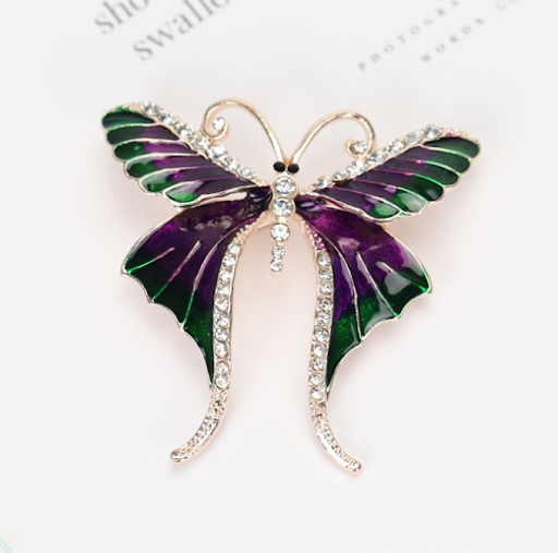 Title 1, Butterfly brooch