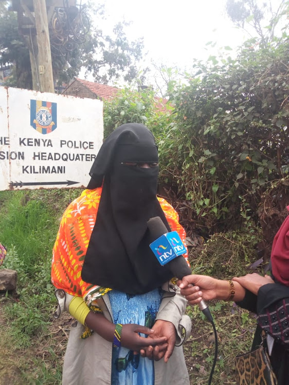 The 13-year-old girl who was sexually abused in KIbra speaking to the press yesterday at the Kilimani Police Station, Nairobi.