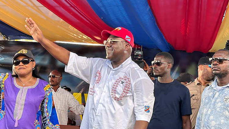 President of the Democratic Republic of Congo Felix Tshisekedi greets supporters during his party’s rally in Mbuji-Mayi on Tuesday.