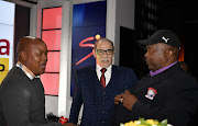 Former Premier Soccer League marketing consultant Peter Mancer (centre) pictured flanked by SA football great and Jomo Comsos owner Jomo Sono (right) and former Cosmos player Lucky Mhlathe during the official launch of the GladAfrica Championship in Randburg in August 2019. Mancer died on Monday.