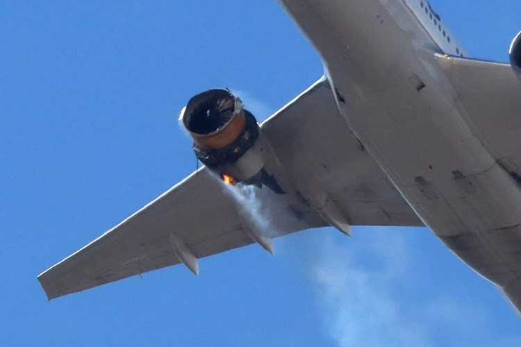 United Airlines flight UA328, carrying 231 passengers and 10 crew on board, returns to Denver International Airport with its starboard engine on fire after it called a Mayday alert, over Denver, Colorado, US February 20, 2021.