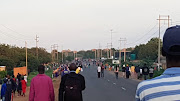 Commuters on the Harare-Bulawayo road on January 14 2019. Commuter omnibus operators stopped providing public transport as a three-day stayaway got under way. 
