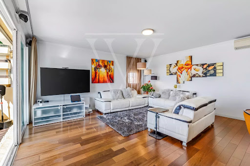 Modern living room white sofas and television - Luxury apartment / penthouse for sale in Saint-Laurent-du-Var, 4 rooms, 3 bedrooms