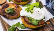 Sweet potato flatbreads topped with spicy homemade tomato sauce, coriander and poached eggs.