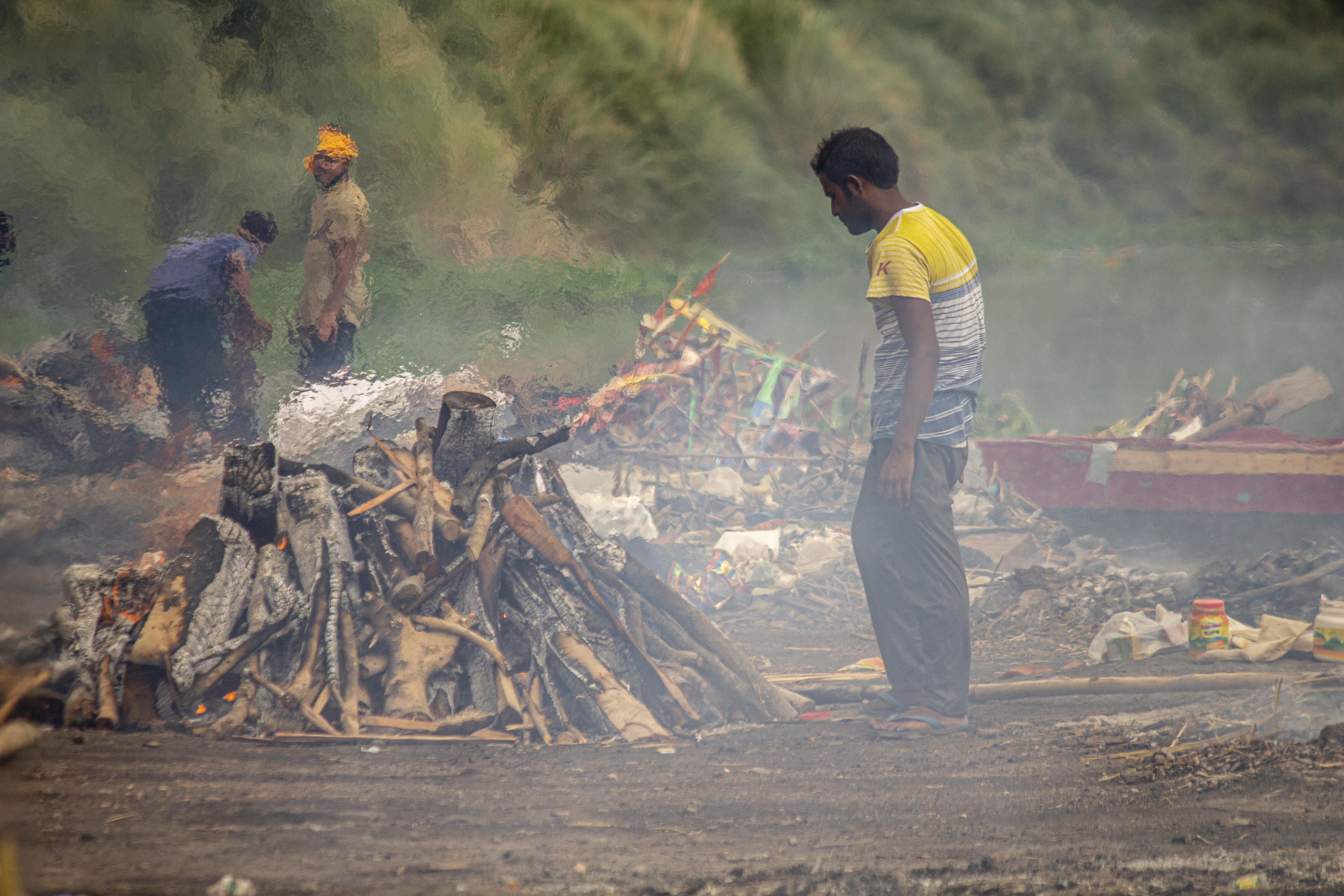 Without safety equipment or fair wages, Delhi’s crematorium workers struggle to make ends meet