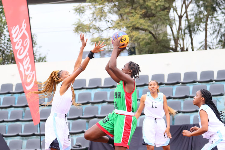 Kenya's captain Abra Achieng hangs up for a shot against Benin's Ramouziath Agbayizo in the 3×3 FIBA Nations League game at Nyayo Stadium.