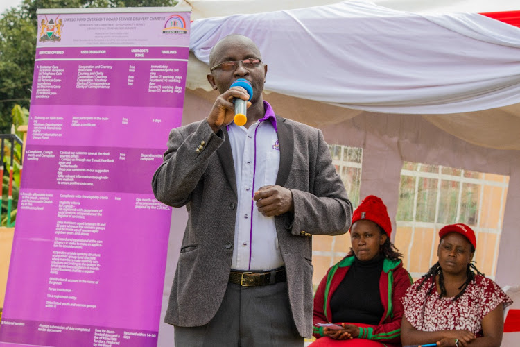 David Mururia, a youth development officer in Kirinyaga county, advises the groups on how to wisely manage their funds.