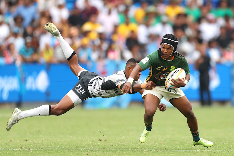 Jaiden Baron of South Africa is tackled during the 2023 Sydney Sevens semifinal match against Fiji at Allianz Stadium in Sydney, Australia on January 29 2023.