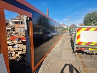 Commercial fencing and hoarding album cover