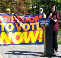 Freedom to Vote relay sign and speaker