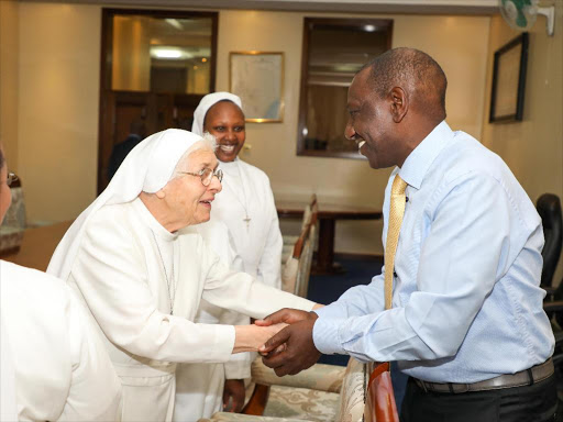 Deputy President William Ruto with Sister Graziana Forte of the Dimesse Sisters at his Karen office/ DPPS