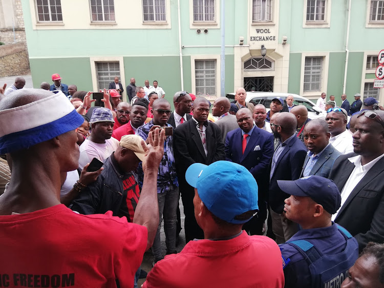 Protesters outside the Nelson Mandela Bay council chambers