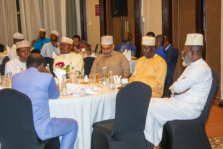 Opposition Leader Raila Odinga with other Azimio la Umoja leaders at an Iftar dinner held in Nairobi on April 18, 2023.