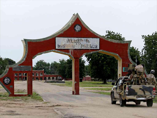 A military vehicle drives into the Emir's palace in Bama, which was the former headquarters of the Boko Haram militants in Bama, Borno, Nigeria, August 31, 2016. /REUTERS