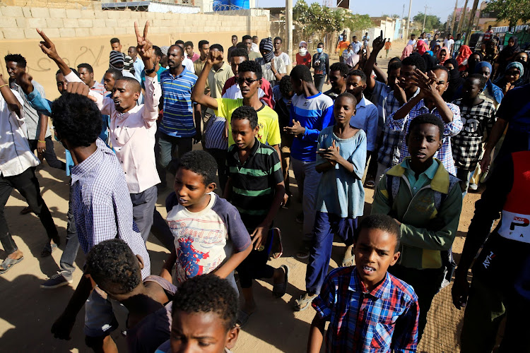 Sudanese demonstrators march as they participate in anti-government protests in Khartoum, Sudan January 24, 2019. Picture taken January 24, 2019.