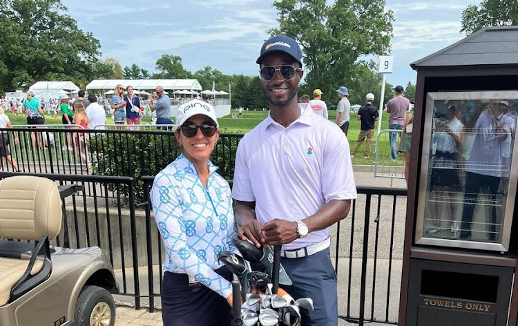 Paula Reto and her caddie, Abimbola Olakanye. Picture: SUPPLIED