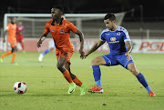 Vusimusi Mngomezulu of Polokwane City and Keegan Ritchie of SuperSport United during the Absa Premiership match between Polokwane City and SuperSport United at Old Peter Mokaba Stadium on May 06, 2017 in Polokwane, South Africa.