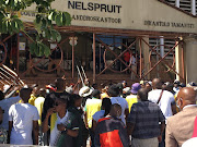 ANC supporters and community members from Pienaar picketing outside the Nelspruit magistrates court calling for the release of Mandla Msibi.