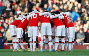 Arsenal players huddle before the match on January 20 2020.