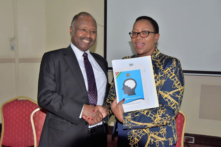 Health CS Sicily Kariuki and Mental Health Task force co-chair Dr Frank Njenga during the inauguration of the task force on December 11, 2019