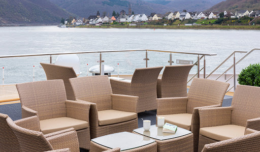 Sit down for a cocktail with a grand view on Avalon Tranquility II's Sky Deck.