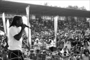 SPELLBOUND: Musician Ntando entertains the crowd on Saturday during SABC2's Dorp 2 Dorp road show in Mpumalanga. PHOTOS: ALFRED MOSELAKGOMO. 23/08/08. © Sowetan.