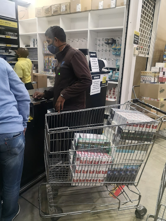 A bulk cigarette buyer stocks up at Makro in Durban