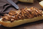 Slow-Cooker Orange-BBQ Pulled Pork Sandwiches was pinched from <a href="http://www.kraftrecipes.com/recipes/slow-cooker-orange-bbq-pulled-pork-108634.aspx?cm_mmc=eml-_-mtd-_-20120812-_-6009" target="_blank">www.kraftrecipes.com.</a>